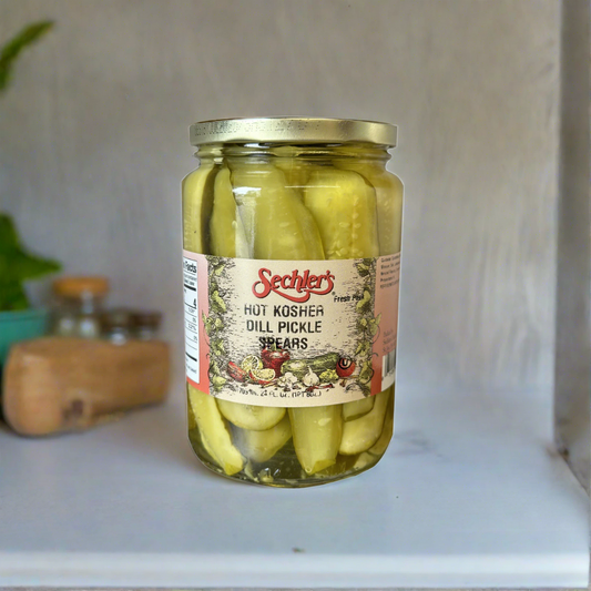 Jar of Hot Kosher Dill Pickle Spears inside kitchen cabinet. 